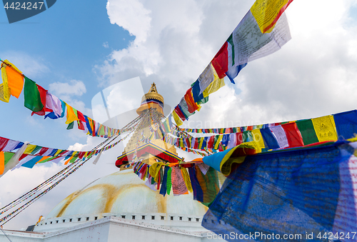 Image of Boudhanath Stupa and prayer flags in Kathmandu