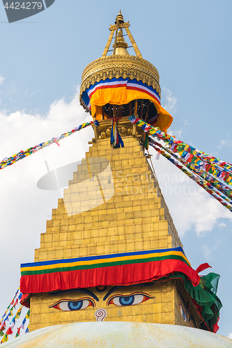 Image of Boudhanath Stupa and prayer flags in Kathmandu