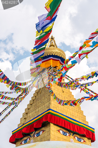 Image of Boudhanath Stupa and prayer flags in Kathmandu