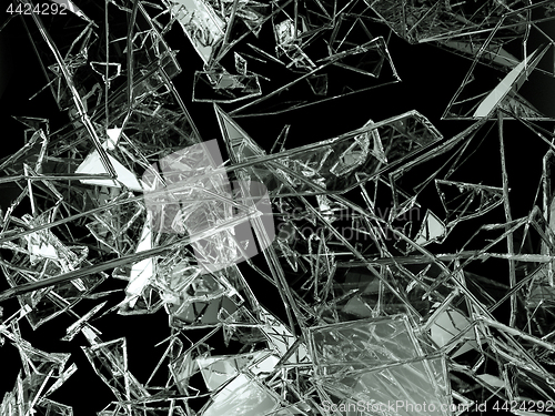 Image of Pieces of glass broken or cracked on black