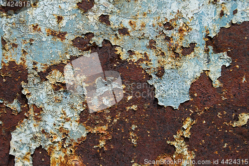 Image of Old blue rusty metal door