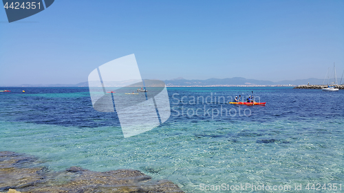 Image of Beautiful sea views with boats and Palma de Mallorca on the hori