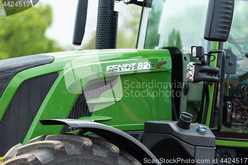 Image of Closeup of the agricultural tractor FENDT 828 Vario on the fields