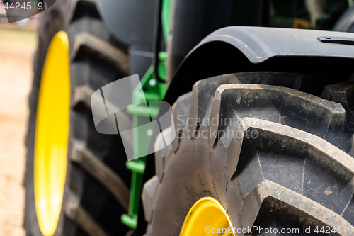 Image of Tractor plowing field