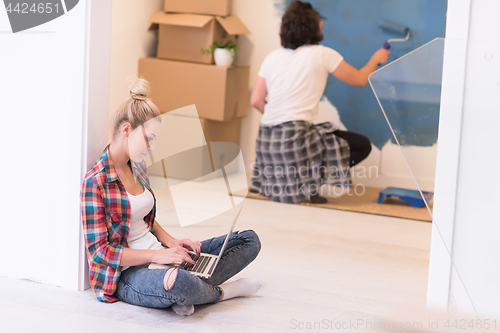 Image of Happy couple doing home renovations