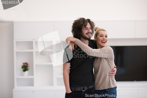 Image of couple hugging in their new home