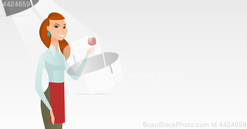 Image of Waitress holding a glass of wine in hand.