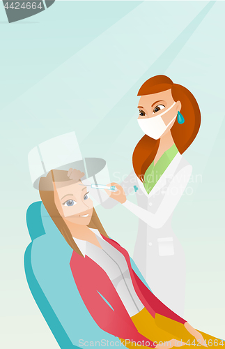 Image of Woman receiving beauty facial injections in salon.