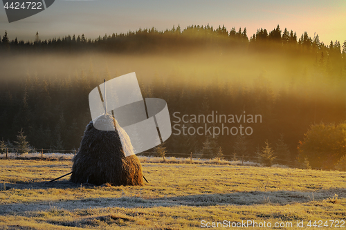 Image of haystack in mountain rural area