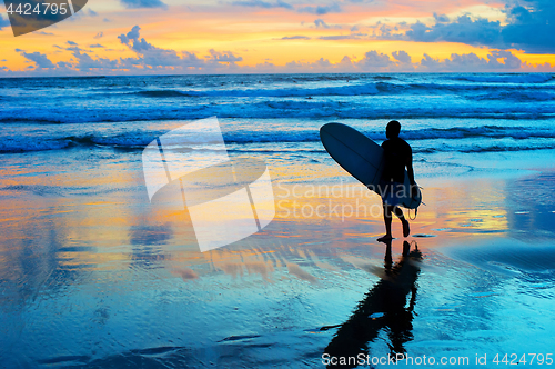 Image of Surfer on the beach