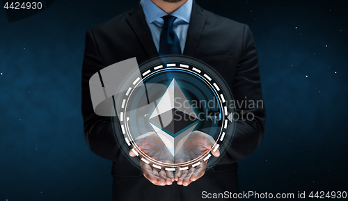 Image of close up of businessman with ethereum over space