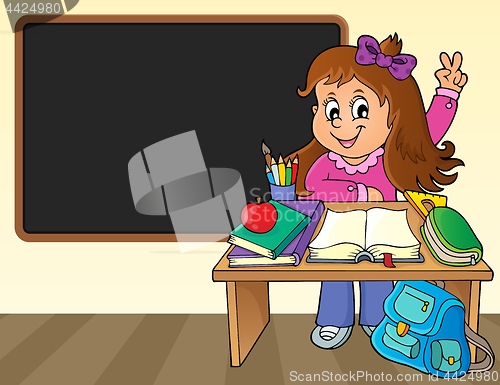 Image of Girl behind school desk theme image 2