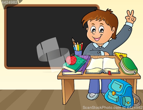 Image of Boy behind school desk theme image 2