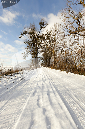 Image of traces of the car on snow