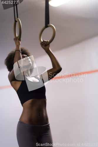 Image of black woman doing dipping exercise