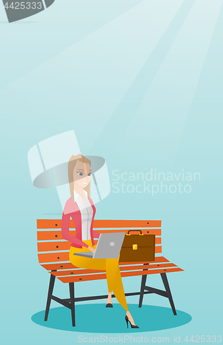 Image of Business woman working on laptop outdoor.