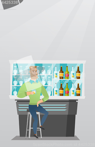 Image of Caucasian man sitting at the bar counter.