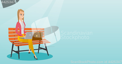 Image of Business woman working on laptop outdoor.