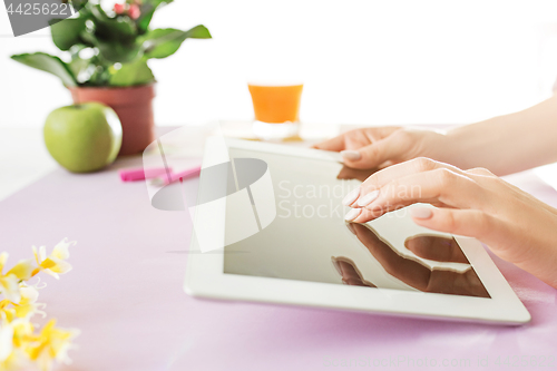 Image of Woman and fruit diet while working on computer in office