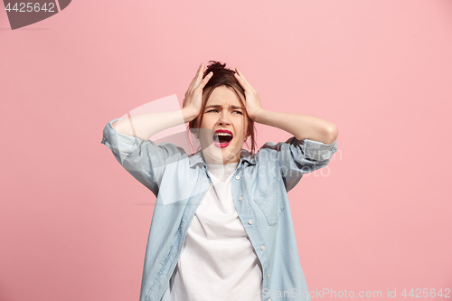 Image of Beautiful woman in stress isolated on pink