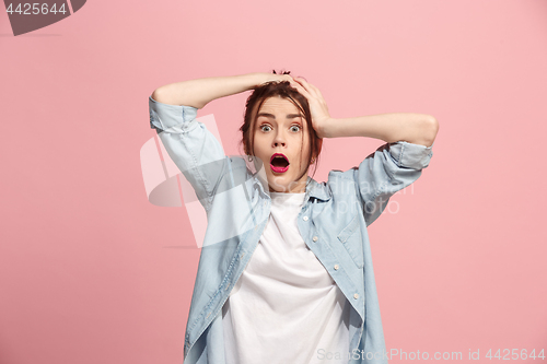 Image of Beautiful woman in stress isolated on pink