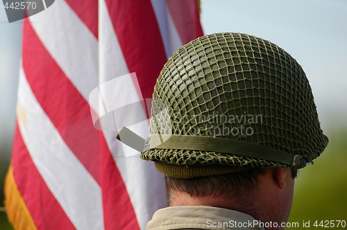 Image of helmet near american flag