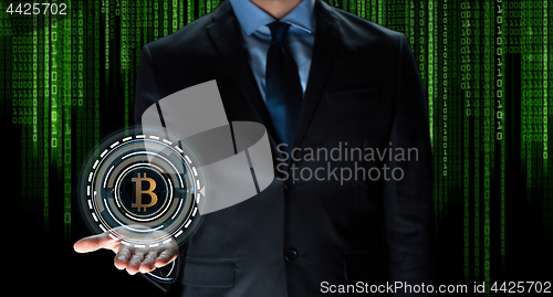 Image of close up of businessman with bitcoin hologram