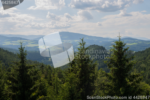 Image of Panoramic view of idyllic mountain landscape in summer