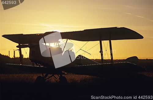 Image of Sunset on  biplane Tiger Moth