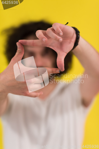 Image of young man with funny hair over color background