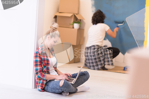 Image of Happy couple doing home renovations