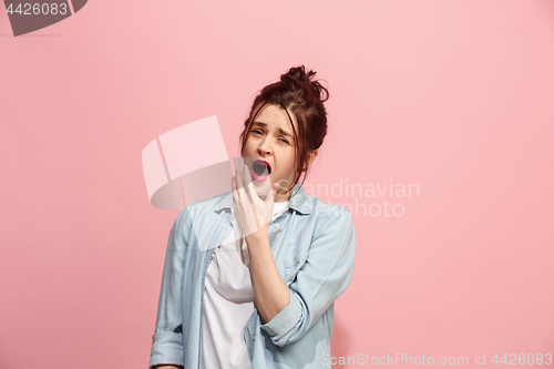 Image of Beautiful bored woman bored isolated on pink background