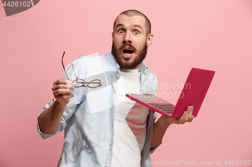 Image of Businessman hugging laptop