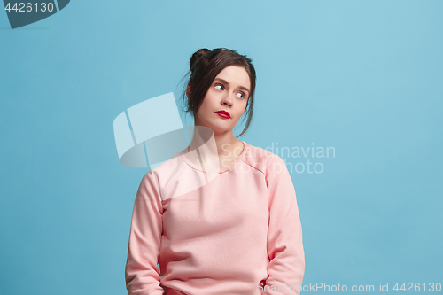 Image of Beautiful bored woman bored isolated on blue background