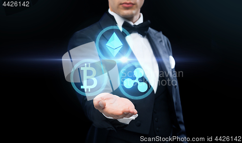 Image of man in tailcoat with cryptocurrency holograms