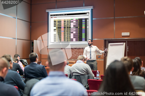 Image of Speaker Giving a Talk at Business Meeting.