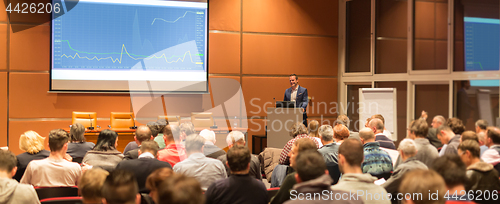 Image of Business speaker giving a talk at business conference event.