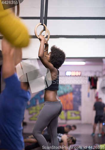 Image of black woman doing dipping exercise