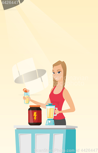 Image of Young woman making protein cocktail.