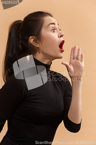 Image of Isolated on pastel young casual woman shouting at studio