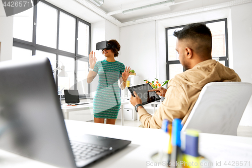 Image of developers with virtual reality headset at office