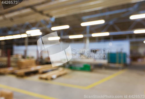 Image of blurred factory workshop background