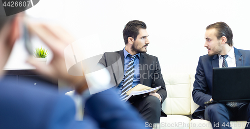 Image of Corporate business team and manager at business meeting.