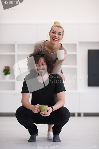 Image of Happy couple in their new home