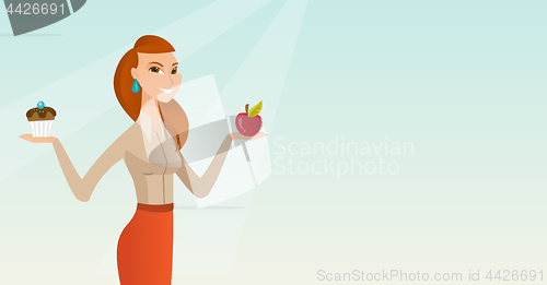 Image of Woman choosing between apple and cupcake.