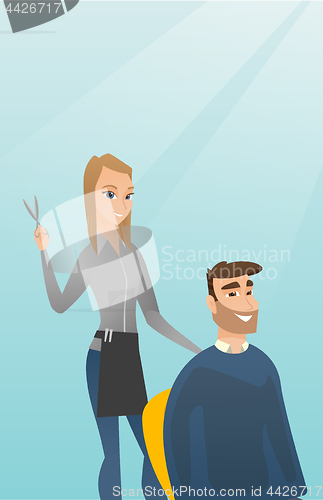 Image of Hairdresser making haircut to hipster man.