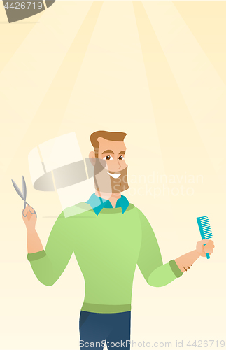 Image of Barber holding comb and scissors in hands.