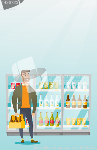 Image of Man with pack of beer at supermarket.