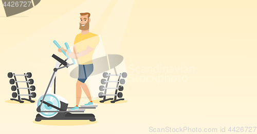 Image of Man exercising on elliptical trainer.