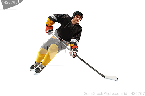 Image of Ice hockey player in action isolated on white.